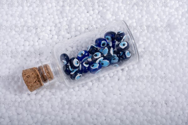 Turkish evil eye beads on white polystyrene foam balls