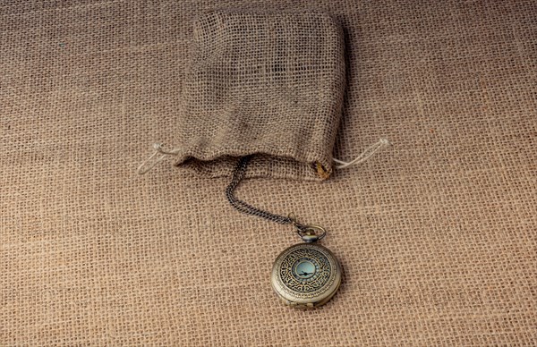 Mechanical pocket watch on a sack