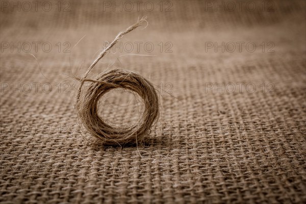 Roll of brown color linen string paper background