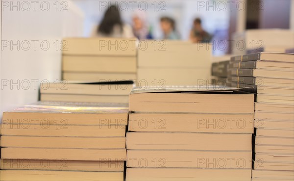 Stack of books stored as Education and business concept