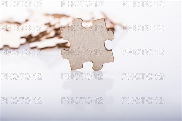Pieces of jigsaw puzzle as problem solution concept on white background