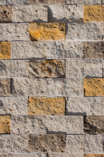 Decorative cubic stone wall as background texture