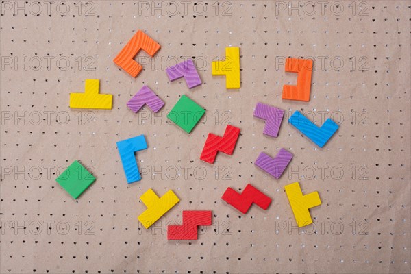 Concept of creative logical thinking. Different colorful wooden blocks. Geometric shapes in different colors