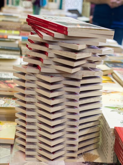 Stack of books stored as Education and business concept