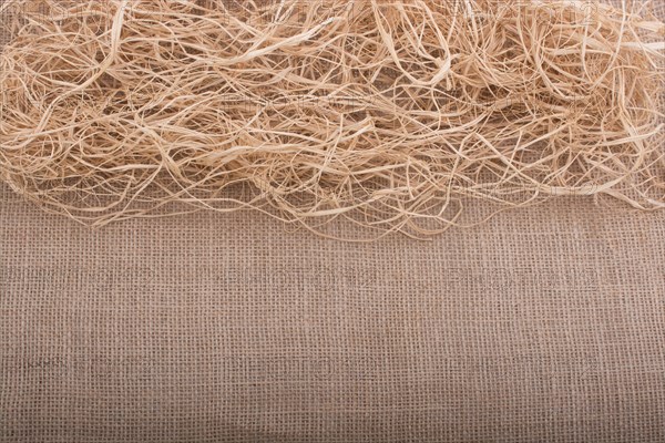 Straw placed on canvas as a background