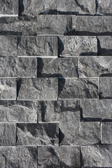 Decorative cubic stone wall as background texture