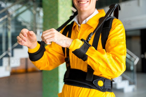 Portrait of an unrecognizable employee with an exoskeleton from a futuristic high-tech warehouse