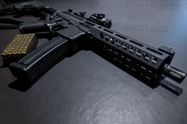 Modern Elegant Assault Rifle and Bullet on Grey Background in Switzerland