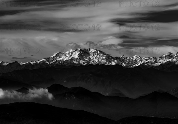 Aerial View over a Beautiful Mountainscape and And Snow Capped Monte Rosa and Mountain Peak Matterhorn and with Floating Clouds in a Sunny Day in Ticino