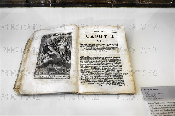 The book was printed on the occasion of the transfer of four catacomb saints from Rome in 1750