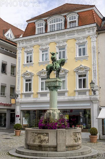 Bronze figure of the Postmichel on the Postmichelbrunnen fountain in Fischbrunnenstrasse