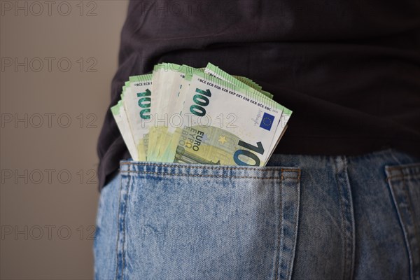 Many one hundred euro notes loose in jeans