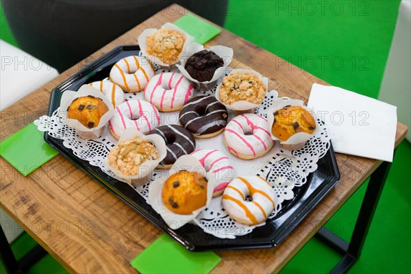 Muffins and bagels on a tray