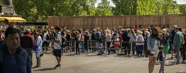 Tourists waiting at the Eiffel Tower