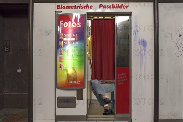 Vending machine for passport photos in a public department stores'