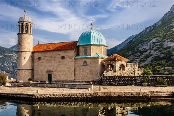 The former seafaring centre of Perast with the beautiful offshore island of Gospa od Skrpjela