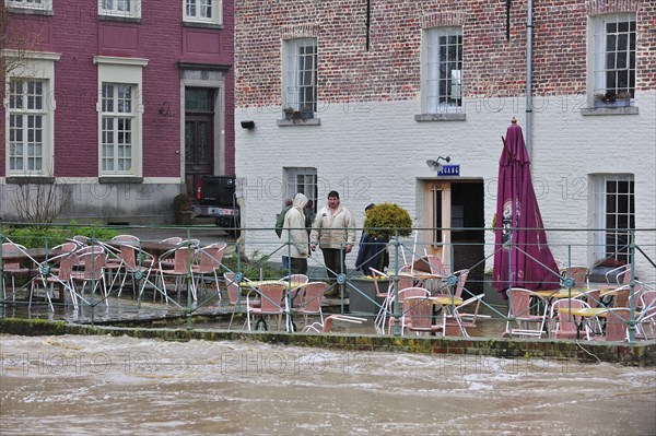 Flooded brook and terrace of restaurant at Nederzwalm