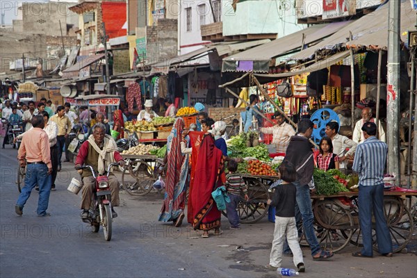 Vendors selling fruit and vegetables on the street in Mathura