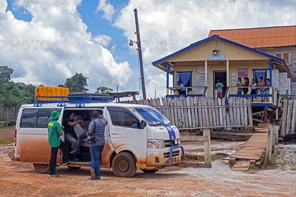 Minibus in front of police check post in the village Mabura along the Linden-Lethem dirt road