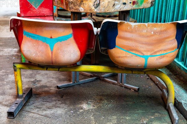 String thong graffiti on chairs