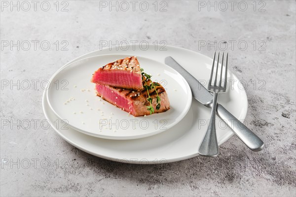 Grilled ahi tuna steak on a plate