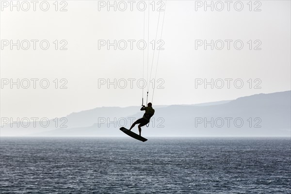 Kitesurfer jumping