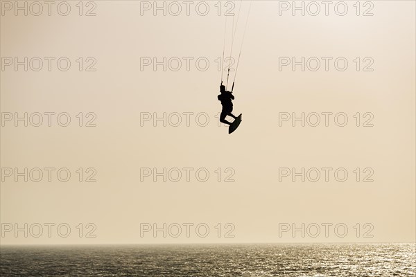 Kitesurfer jumping