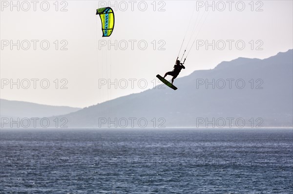 Kitesurfer jumping