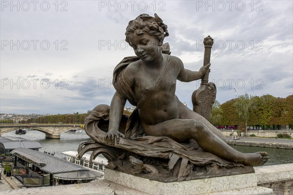 Female sculpture on Pont Alexandre III
