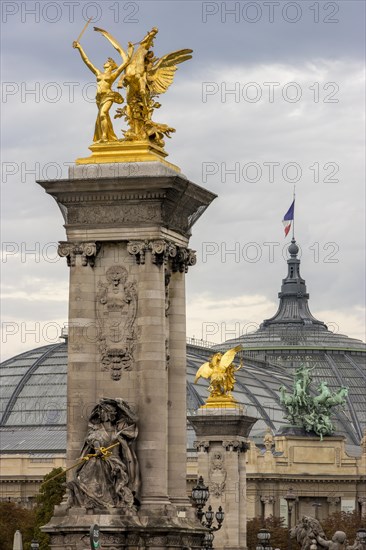 Columns with sculptures on the Pont Alexandre III