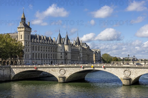 Bridge on the River Seine Pont au Change and Tour de l'Horloge du Palais de la Cite