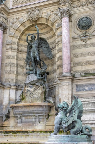 Bronze statue of the fountain La Fontaine Saint Michel