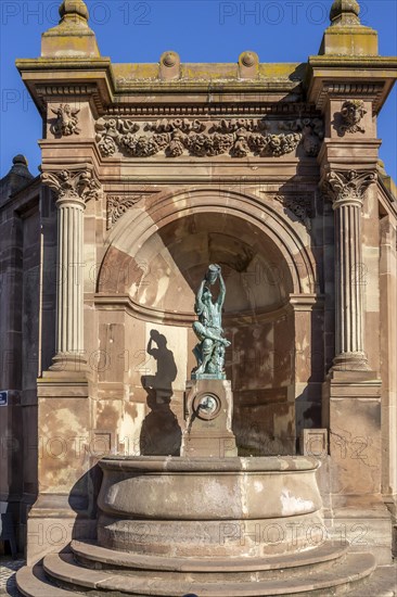 Fountain with bronze statue of The Little Winegrower