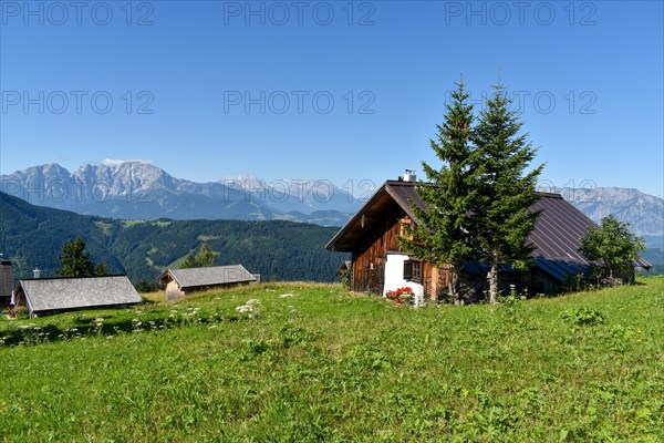 Alpine huts of the Spielbergalm with a view of the Berchtesgaden Alps with Hoher Goell