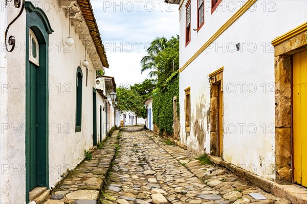 Old street with historic colonial-style houses and cobblestones in the famous city of Paraty in the state of Rio de Janeiro