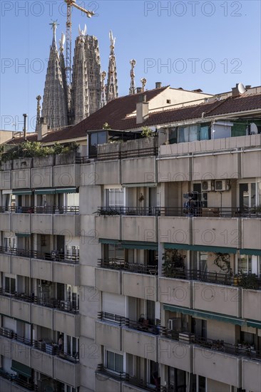 View of the Sagrada Familia and neighborhood buildings in Barcelona Spain