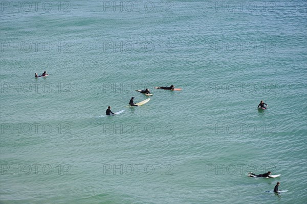 Surfers in the surf at Sagres beach