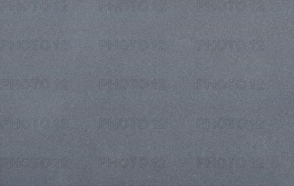Grey metal background with shiny speckles
