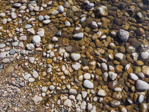 Cobble in water background