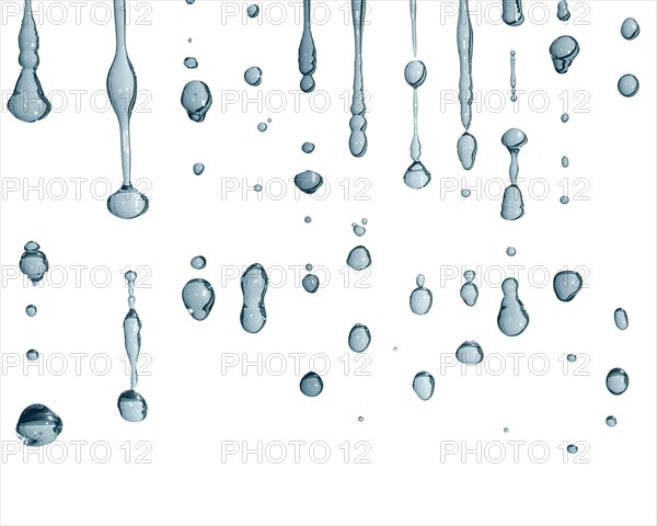 Water droplets over white