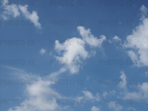 Blue sky with clouds background