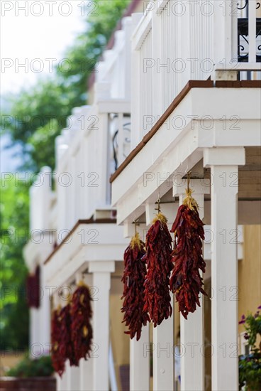 Chilli peppers on a house porch