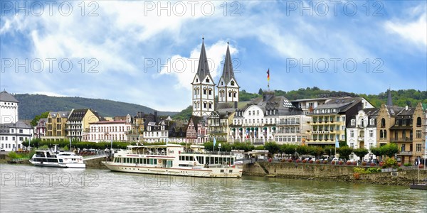 Tourist boat anchored in front of St. Severus Church