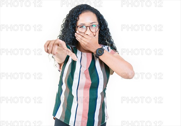 Afro woman laughing at you pointing at the camera