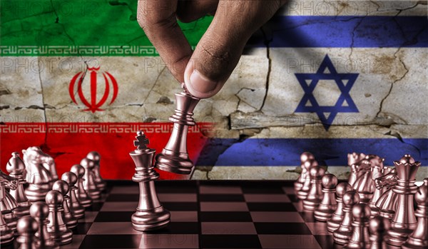 Israel vs Iran flag concept on chessboard. Political tension between Iran and Israel. Conflict between Israel and Iran on pieces of chessboard