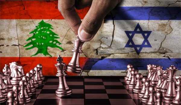 Israel vs Lebanon flag concept on chessboard. Political tension between Lebanon and Israel. Conflict between Lebanon and Israel on pieces of chessboard