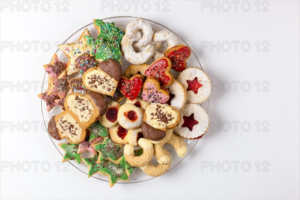 Glass plate with various Christmas biscuits