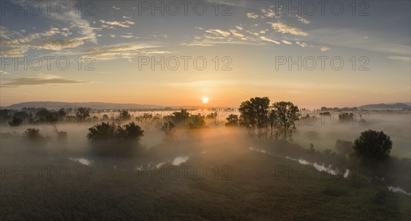 Aerial panorama of the Radolfzeller Aach in the Radolfzeller Aachried at sunrise and ground fog