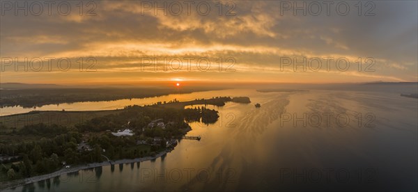 Aerial panorama of western Lake Constance at sunrise with the Mettnau peninsula