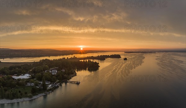 Aerial panorama of western Lake Constance at sunrise with the Mettnau peninsula